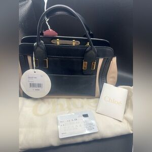 Chloé Alice handbag featuring a black and beige leather design. Crossbody EUC
